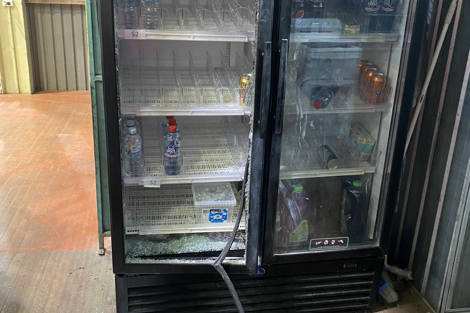 The smashed fridge at the Mareeba Basketball Hall