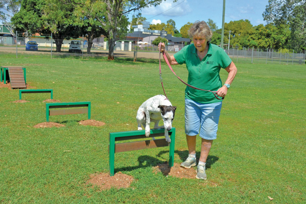 Mareeba Animal refuge pup Pretty and Jennifer Walsh testing out the new agility course at the Mareeba Dog Park