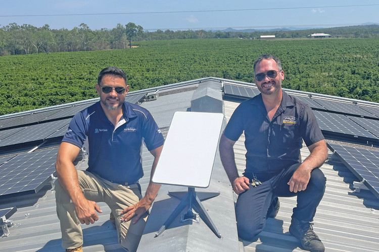 AirBridge Networks founder and managing director Douglas Stephens with Jaques Coffee Plantation owner Jason Jaques after installing the new Starlink system