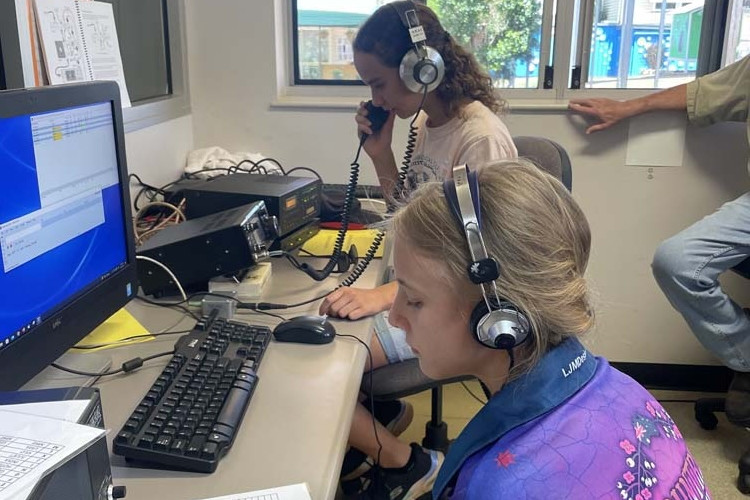 Kairi State School students speak to the world during the CQ WW radio contest.