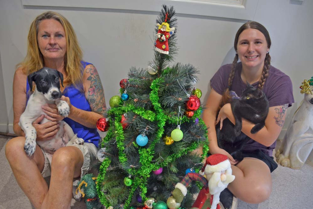 Felicity Pollard and Kerry Gardner with their residents getting ready for Christmas.