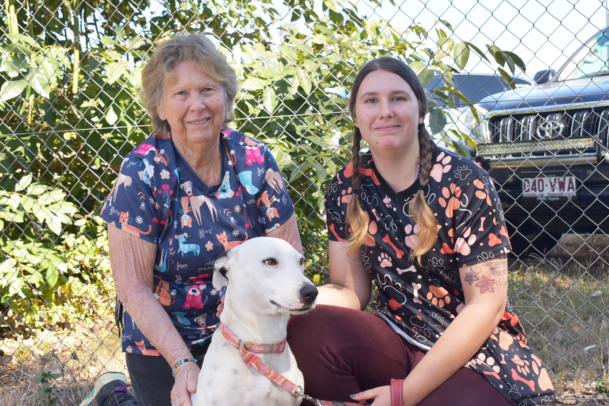 Dogs like three-year-old Lola, who has been at the refuge for three months, rely upon people like refuge manager Jennifer Walsh and staffer Felicity Pollard to help them.