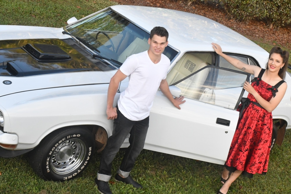 Dressed in “Rockabilly” style, Andrew Oberthur and Emily Bensilum with the GT351 Ford Falcon that will be on show.