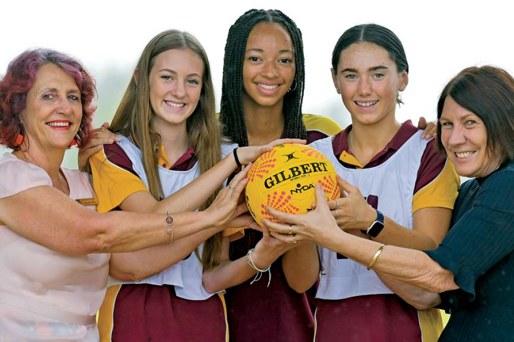 Atherton State High School business manager Margaret Selby, students Sophie Withers, Asha Simmons and Carlee Bloomfield and principal Leanne Knight-Smith are excited for a new multipurpose netball hall at their school.