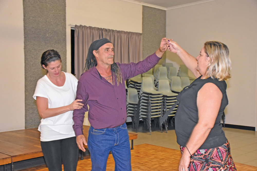 Dancing instructor Ulrike Nicholls teaching Paul Walker and Teresa Petricevic.
