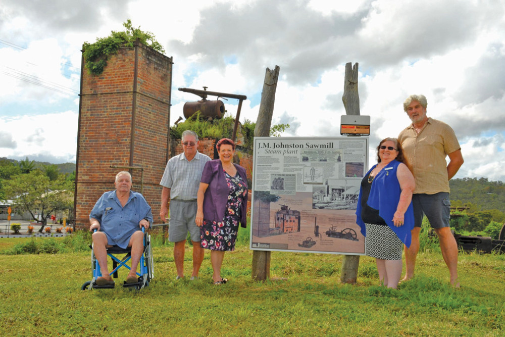 A former employee of the JM Johnston sawmill Clarrie Dickfos, Boiler Block committee member Cyril Vains, Mareeba Shire Mayor Angela Toppin, CWA president Christine Mckerlie and Boiler Block committee president John Brisbin after receiving a $1000 check from the CWA.