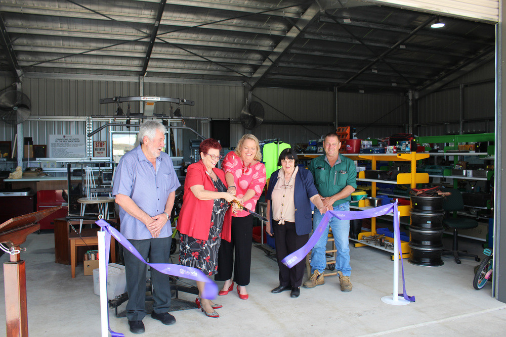 OPEN: Mayor Angela Toppin and Cr Lenore Wyatt cut the ribbon to the Buy Back Shop, flanked by with Cr Mario Mlikota (left), and Crs Mary Graham and Danny Bird.