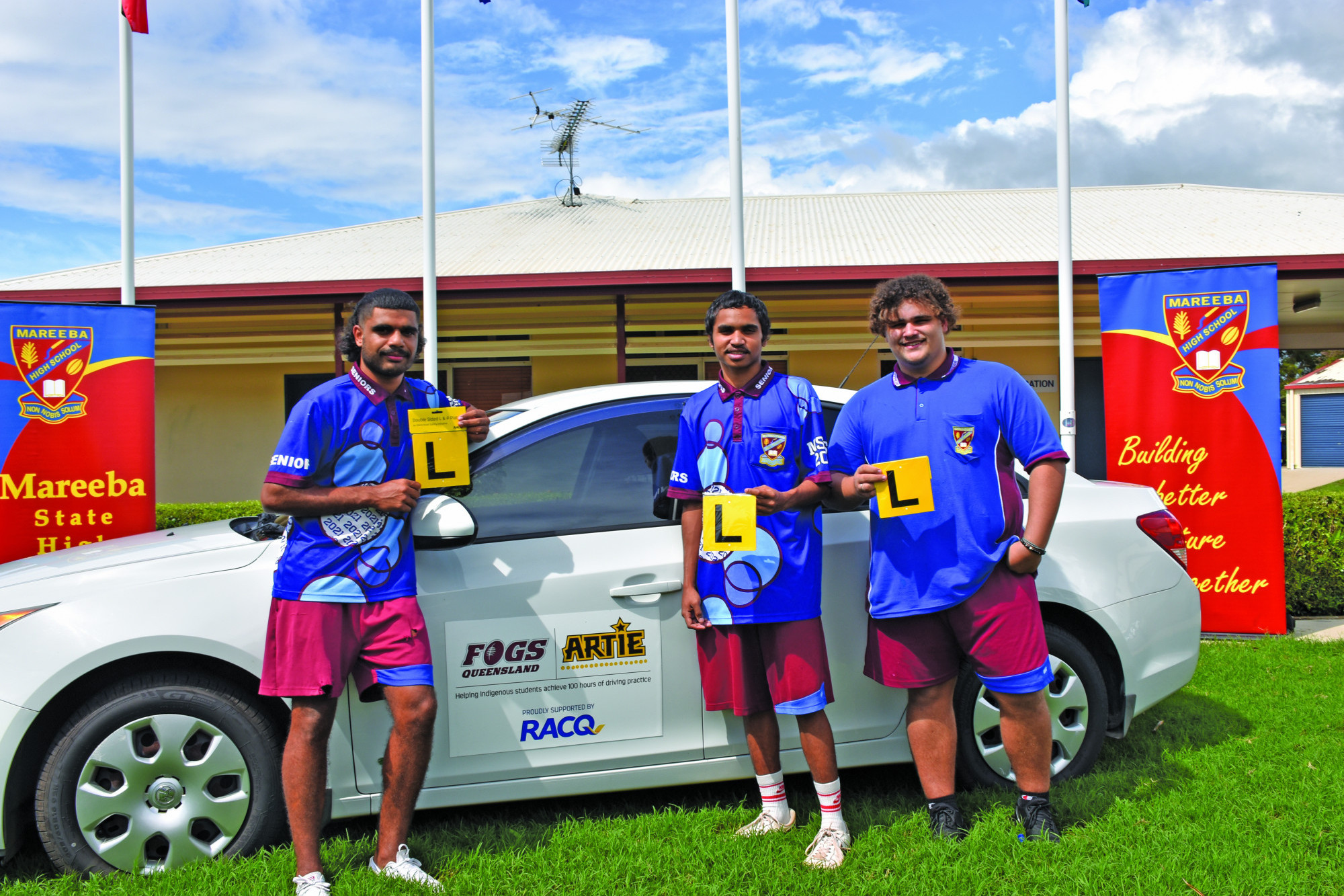 Mareeba State High School Students with the new car that will be used to help students in the ARTIE program to get their 100 hours