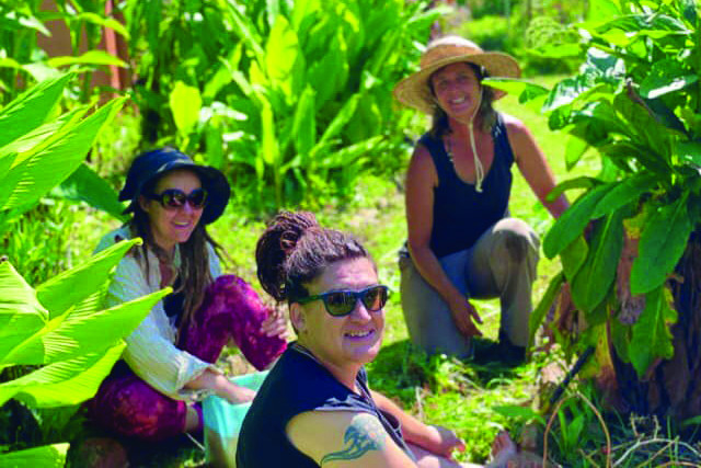 Erika Goodall, Shaelene Spiteri and Melinda Mahon enjoy working in the Ravenshoe community garden.