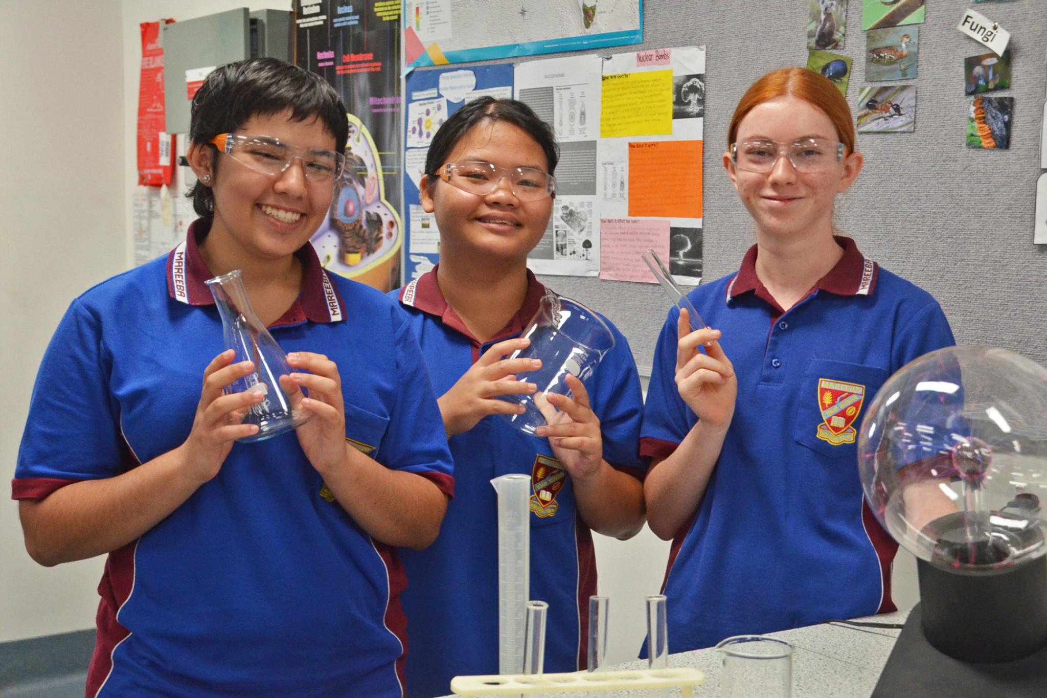 Year 10 students Niah Abdalla-Caamano (left), Kyzj Catipay, and Lael Owens were selected to partake in the Curious Minds program, an eight-month mentoring program exploring the fields of STEM.