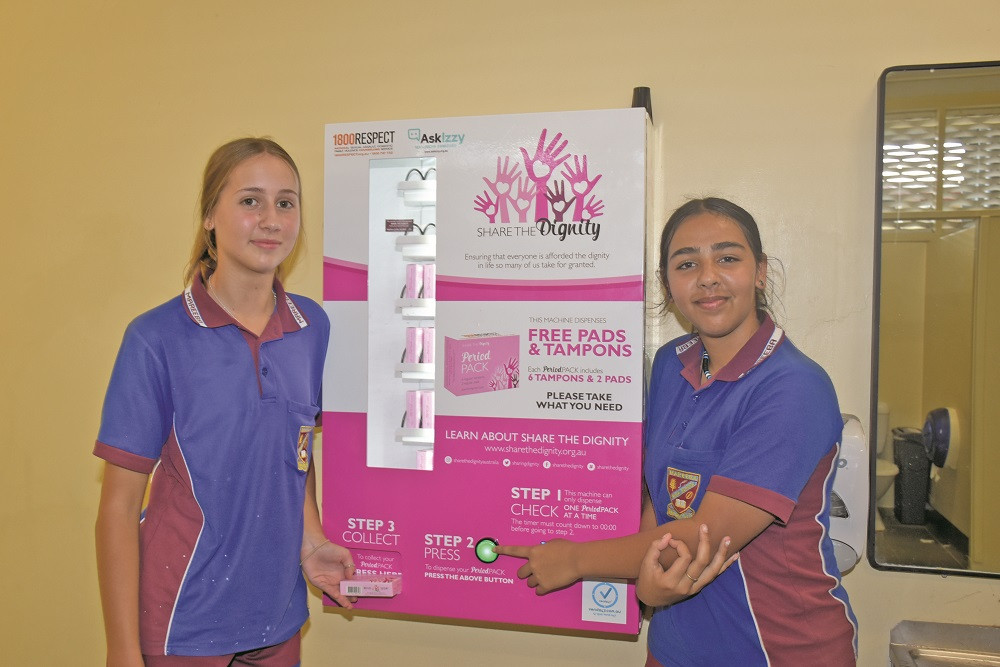 Mareeba High School Grade 9 students, Jaclyn France and Freya Gutchen, are excited to have access to free period products in their school bathroom.