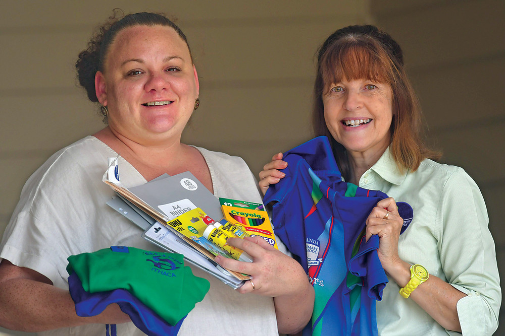 Echo Donator Amanda and Echo admin support Esther Hacket with donated Back to School supplies