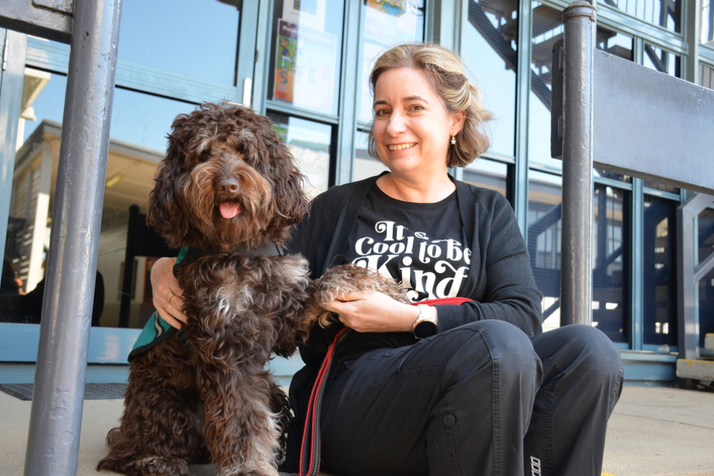 Rosie the Double Doodle emotional support dog at St Thomas’ with school councillor Janine Butler.