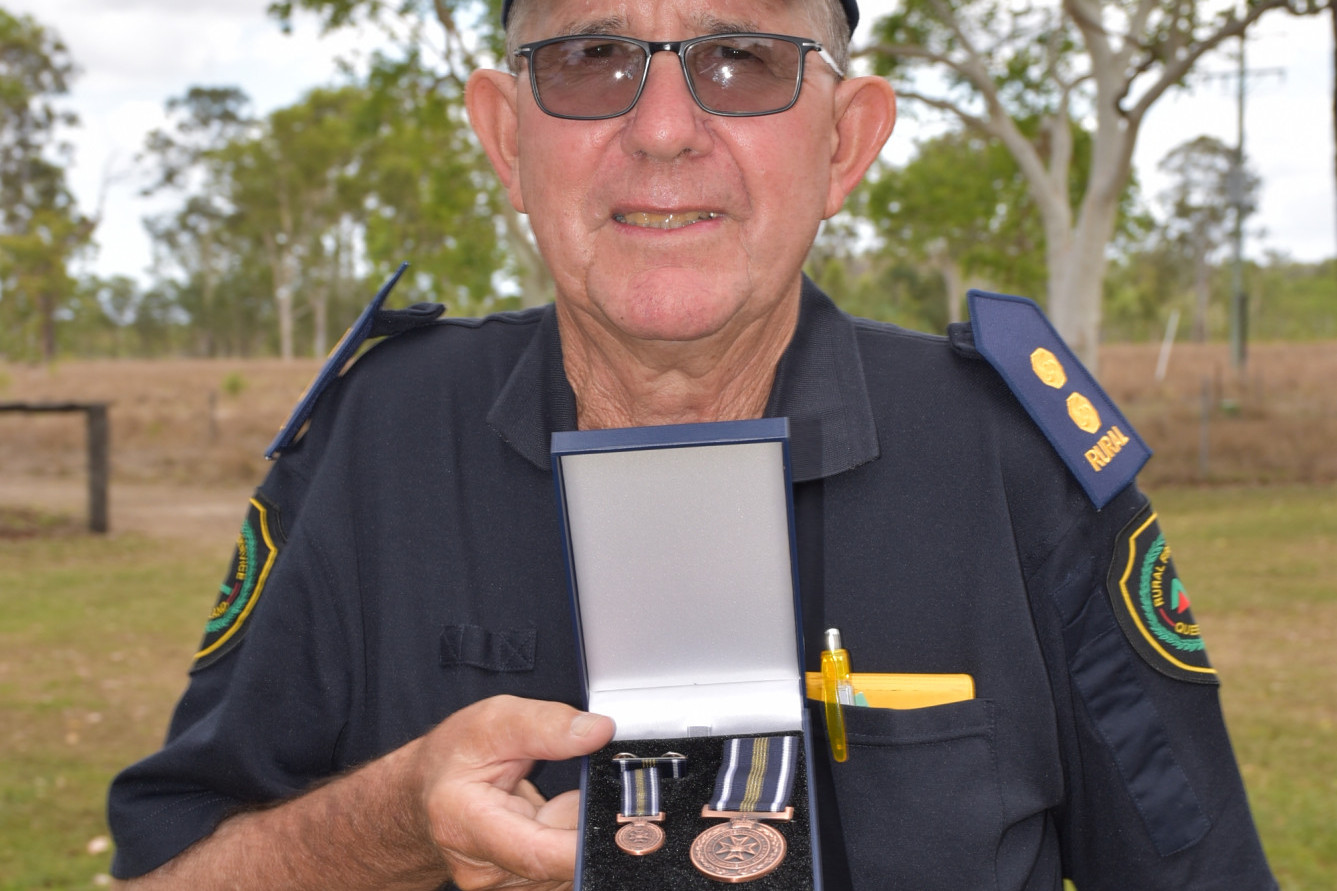 RECOGNITION: Maxwell Hubner, a founding member and current First Officer of the Paddys Green Rural Fire Brigade was awarded two QFES medals on Saturday, December 12.