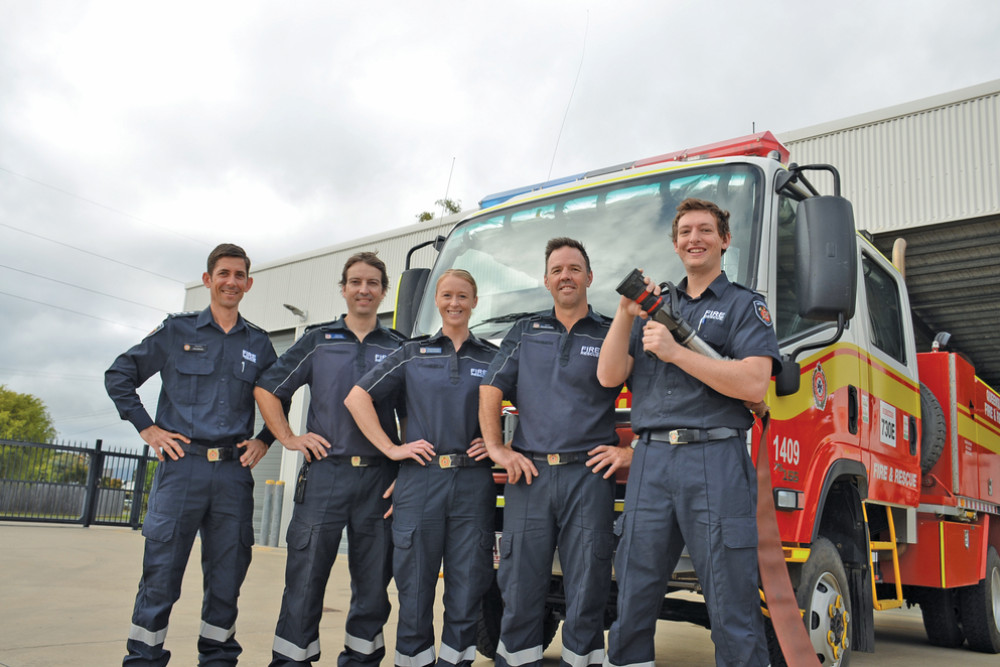 Queensland Fire Inspector and acting Area Commander Jack Emeleus with auxiliary fire fighters Jamie Ryan, Louise, Ben Turner and Jared Hohns are geared up for bushfire season this year.
