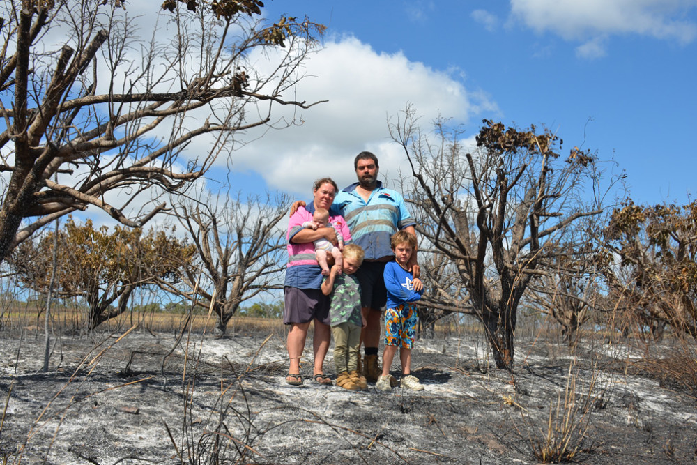 devastation: Veronica and Joe Bacchion and their three young kids Giuseppe, Mataio and Dantay in what is left of their lychee farm