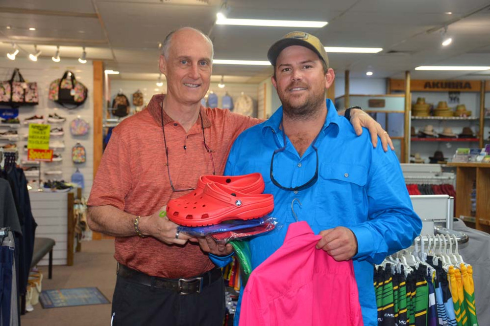 Robert Cater gifts Robbie Weedon workwear after he lost everything during the recent flooding event.