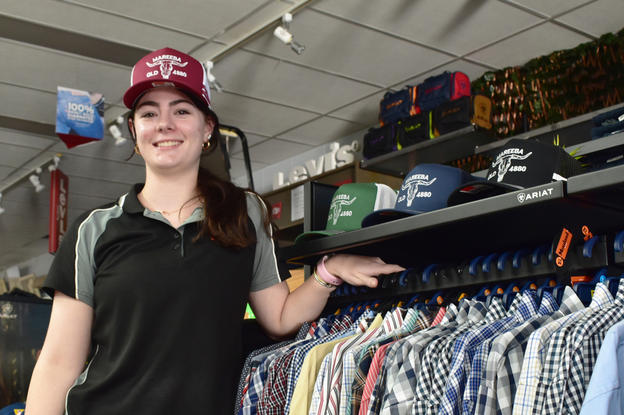 Retail assistant Caitlyn Parsons at Claude Cater Mensland which is one of 20 businesses that participate in the Mareeba “Shop Local” gift card program.