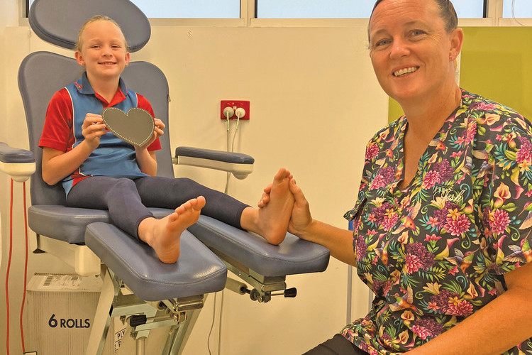 Lillie Hogan (left) who has a heart condition called Wolf Parkinson’s White Syndrome with her mum Tash (right) who is a podiatrist at Amaroo Medical are doing the “Two Feet and a Heart Beat” charity walk this year.