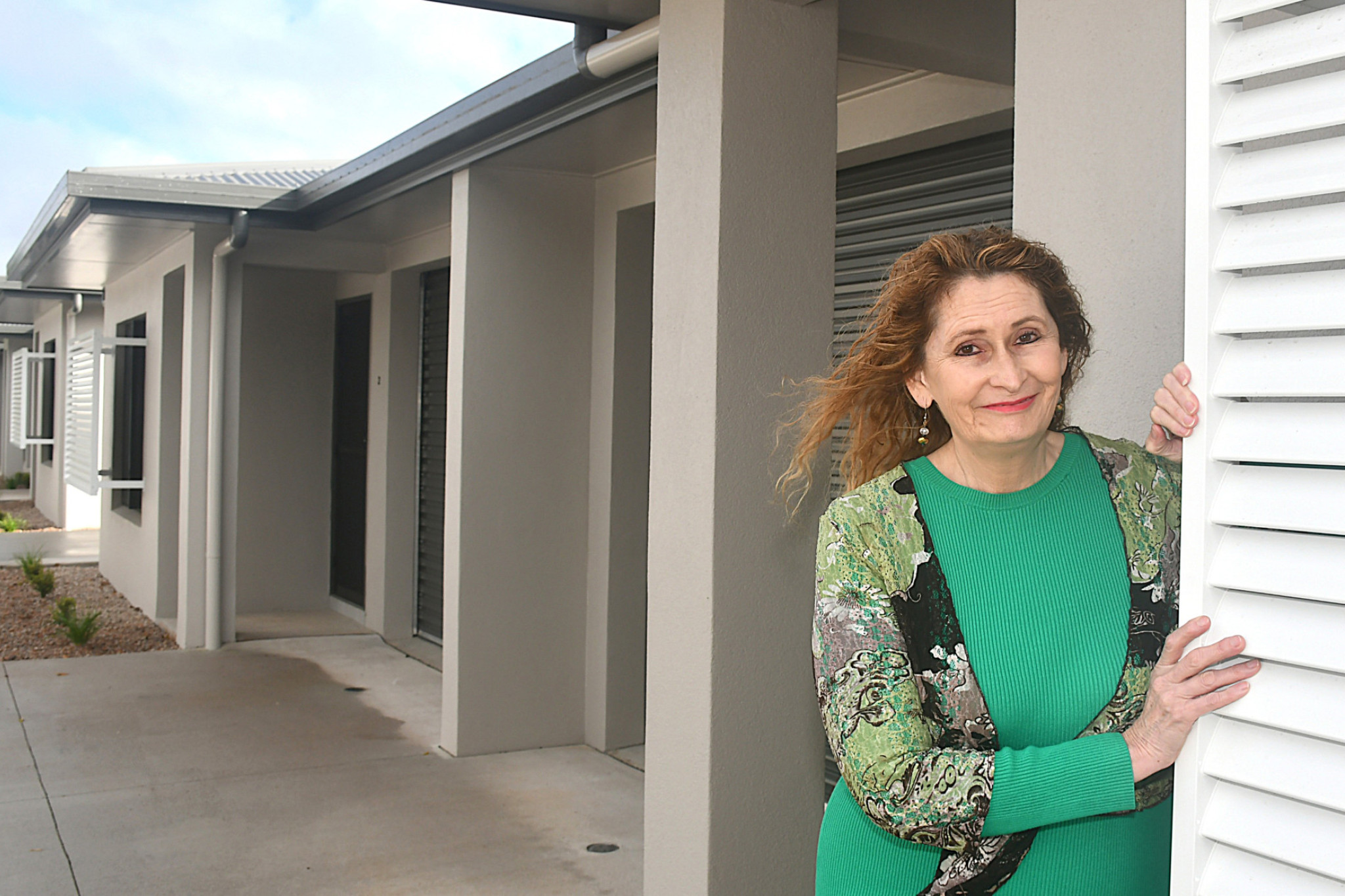 Tablelands Community Housing chief executive officer Cate Teece is thrilled that two 10-unit complexes are coming online in Atherton that will help reduce the number of homeless people.