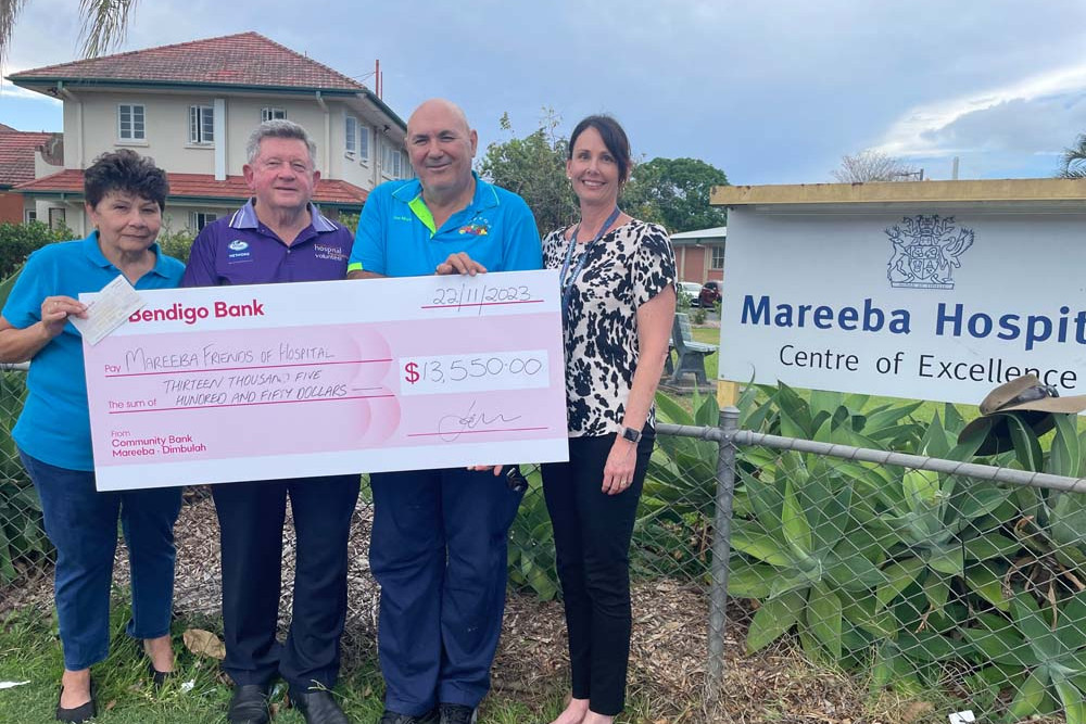 Angela Musumeci from the Lady of the Chain group, Mareeba Friends of the Hospital Foundation chairman Tom Braes, FNQ Growers president Joe Moro and Mareeba Hospital Director of Nursing Michelle Bombardieri outside the Mareeba Hospital with a cheque that will help purchase much-needed equipment.