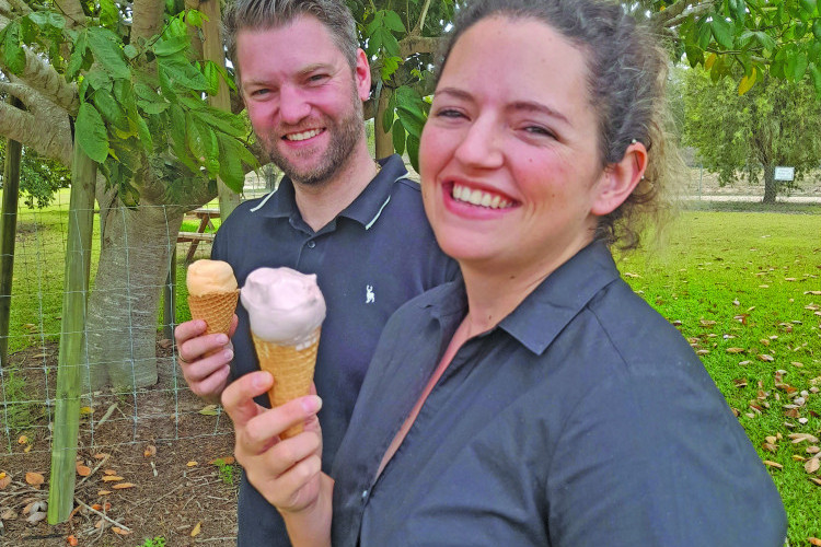 Mike and Clare Bees enjoy the fruits of their labour, eating some of the home-made ice cream they sell at Emerald Creek Ice Creamery.