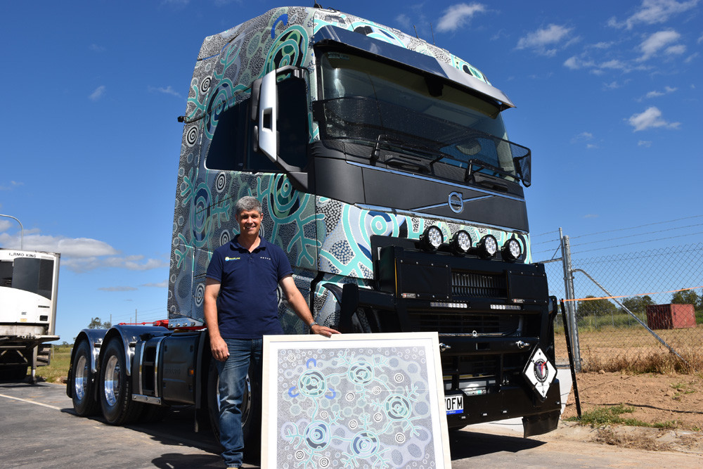 Swiss Line Transport owner Andre Voegeli is proud to be awarded a new one-of-a-kind Indigenous art wrapped truck.