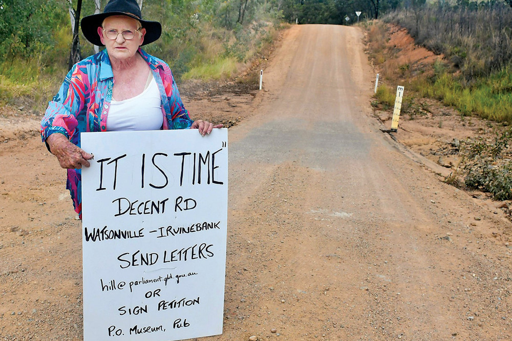 Irvinebank long time resident Di Delaney at the causeway near the Jumna Dam turn off where sealing the road would make it safer for visitors to use. A petition has been launched to put more pressure on the state to seal parts of the road