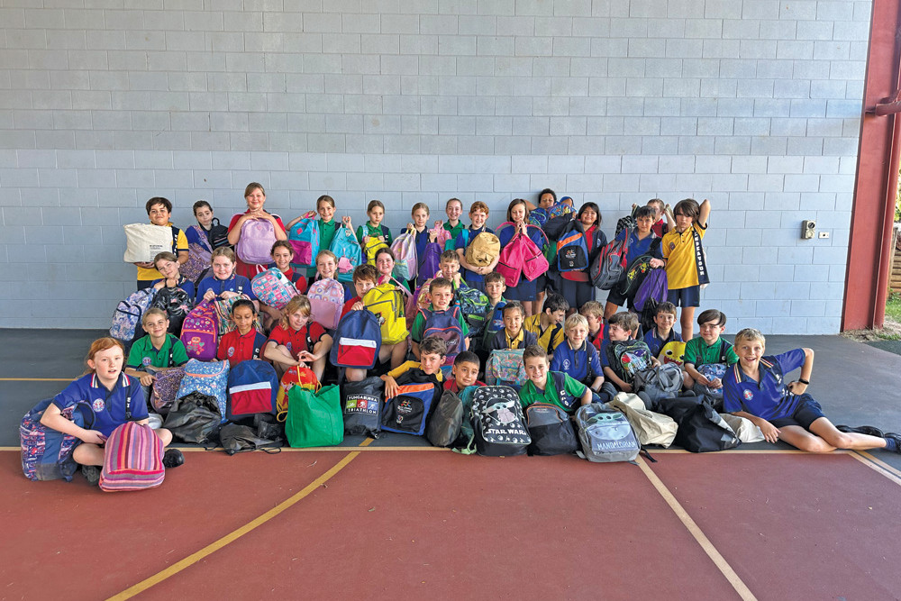 Grade 5 students at St Joesph’s School Atherton with care bags that were sent to Lihir Island, Papua New Guinea