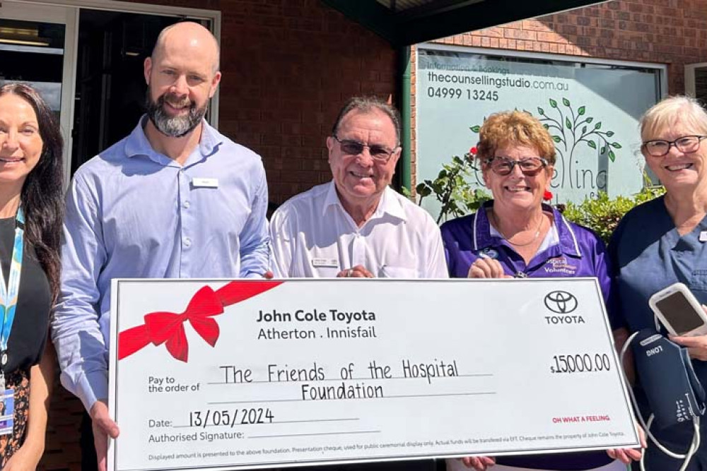 (from left) Foundation volunteer program coordinator Skye Shier, Adam Cole, John Cole, Atherton Friends president Mary Fitzsimons and Malanda Primary Health Clinic Clinical Nurse Consultant Rachel Bernays with the vital signs monitor.