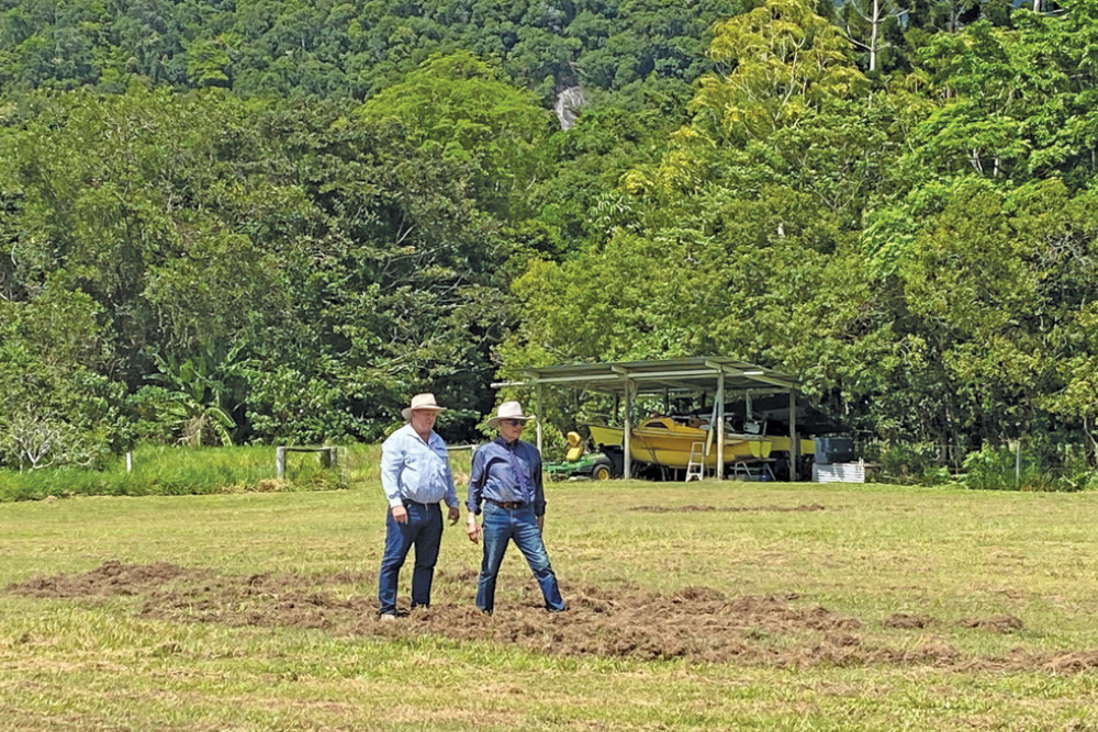 Member for Hill Shane Knuth and Federal Member for Kennedy Bob Katter inspecting damage done by feral pigs on a property.