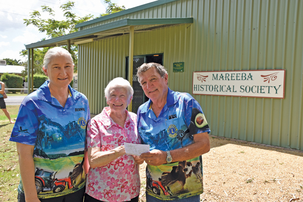 Mareeba Historical Society secretary Helen Kindt (centre) with Mareeba Lions Club members Deanna Percy (left) and Denis McKinley (right