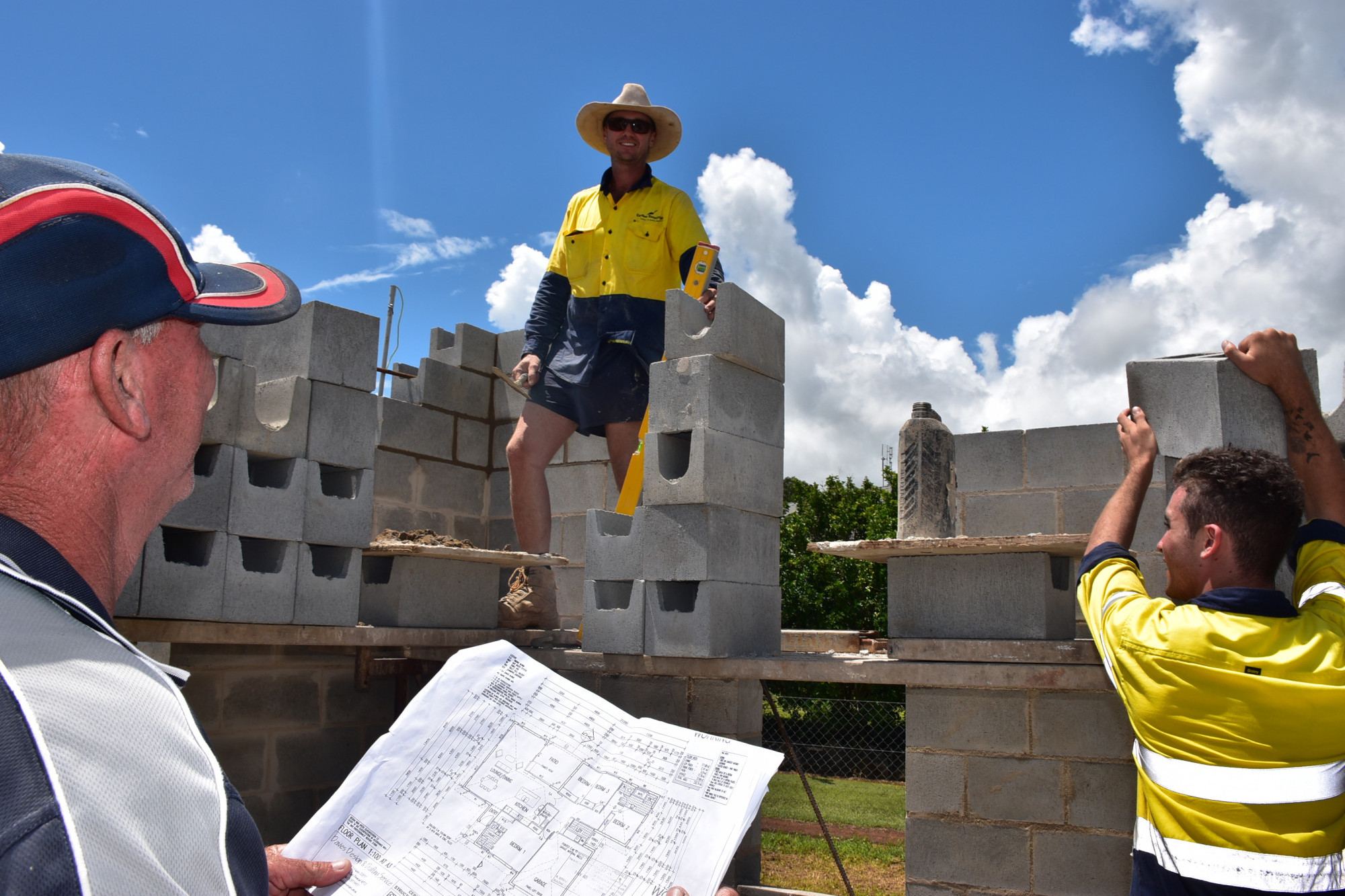 BUILDING BOOM: Shane Smith Builders Work Supervisor Tony Martin overseeing Wayne Cardew and Levi Marsh’s work on one of their new homes under construction at Rayfield Estate in Mareeba.