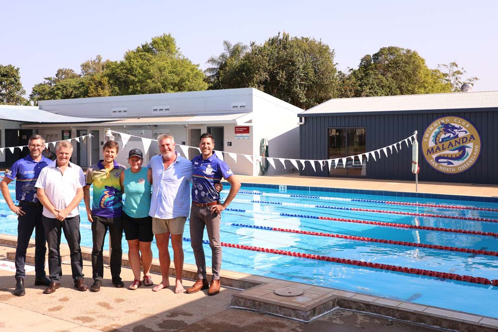 Malanda State School business manager Troy Degenhardt, Cr Dave Bilney, Malanda Swim Club president Tim Cockrem, Malanda Swimming coaches Anita Skews and Keenan Wockner with principal Mark Allen at the Malanda Swimming pool which has finally reopened.