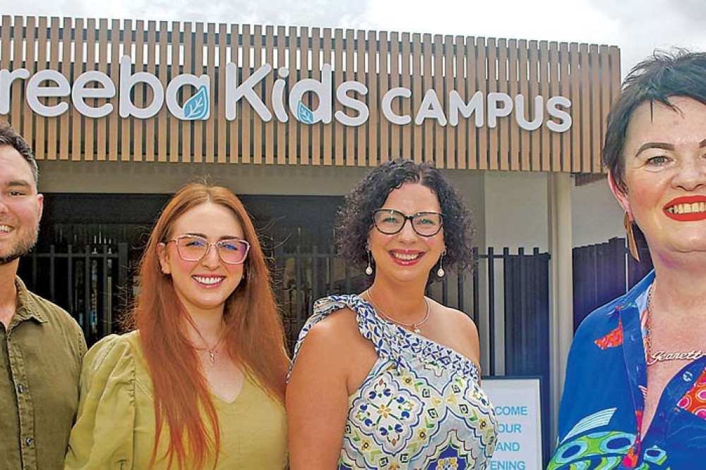 Kids Campus board member Micah Hart, treasurer Emily Hart, Chair Kim Kelly, and CEO Jeanette Sturiale.