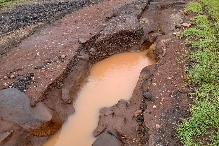 Residents of McIver Road have been dealing with massive washouts like the one pictured for the past few years as they continually plead to Mareeba Shire Council to seal the remainder of the road.