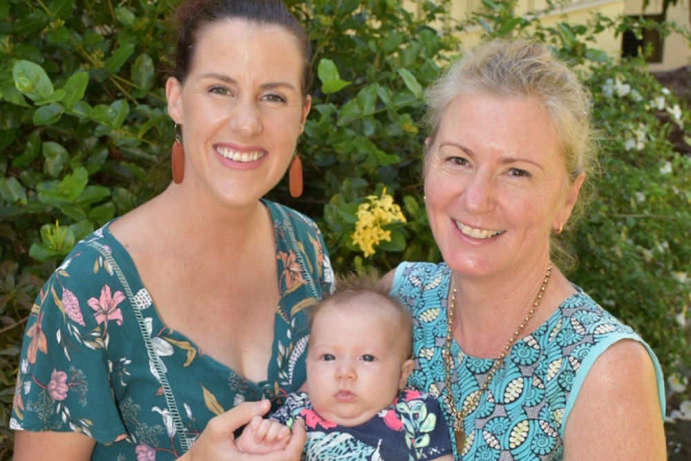 Mareeba Hospital Midwife Wendy Hilless (right) helped deliver Asha Joubert’s first two children and recently she helped deliver her third, nine week old Nienke.