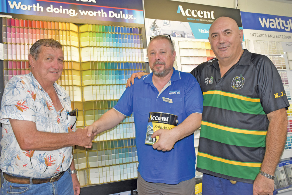 Local hardware store Sunshine Mitre 10 is offering businesses free paint to cover up vandalism. Pictured is manager Trevor Abberley with Mareeba Crime Action Group spokesperson Denis McKinley and Mareeba Chamber of Commerce president Joe Moro.