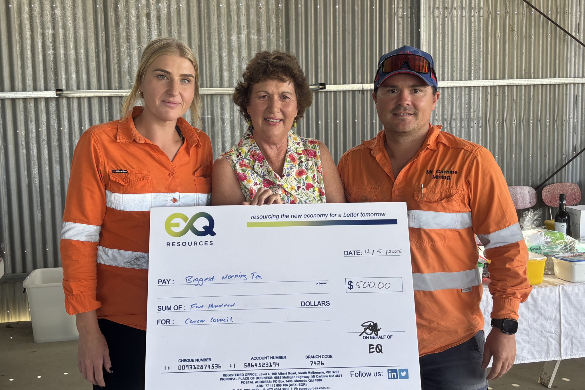 Rubi Brittain (left) and Kiale Crother presented Karen Pedersen (middle) with a $500 cheque.