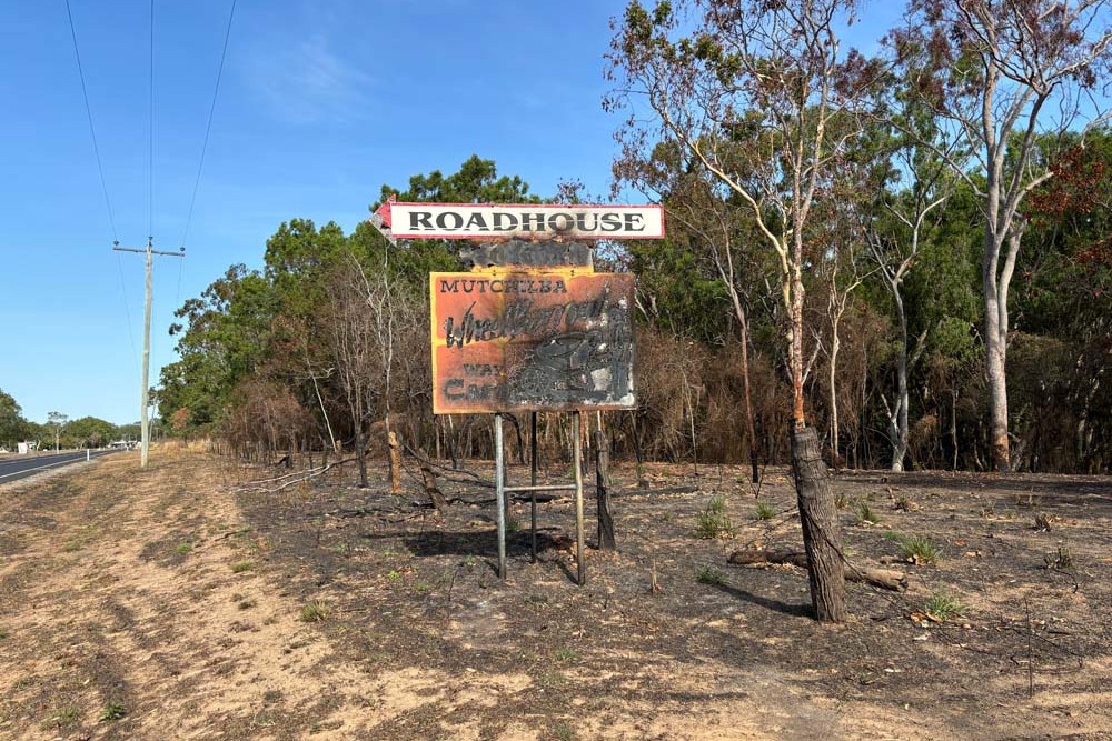 A burnt out sign near Mutchilba roadhouse