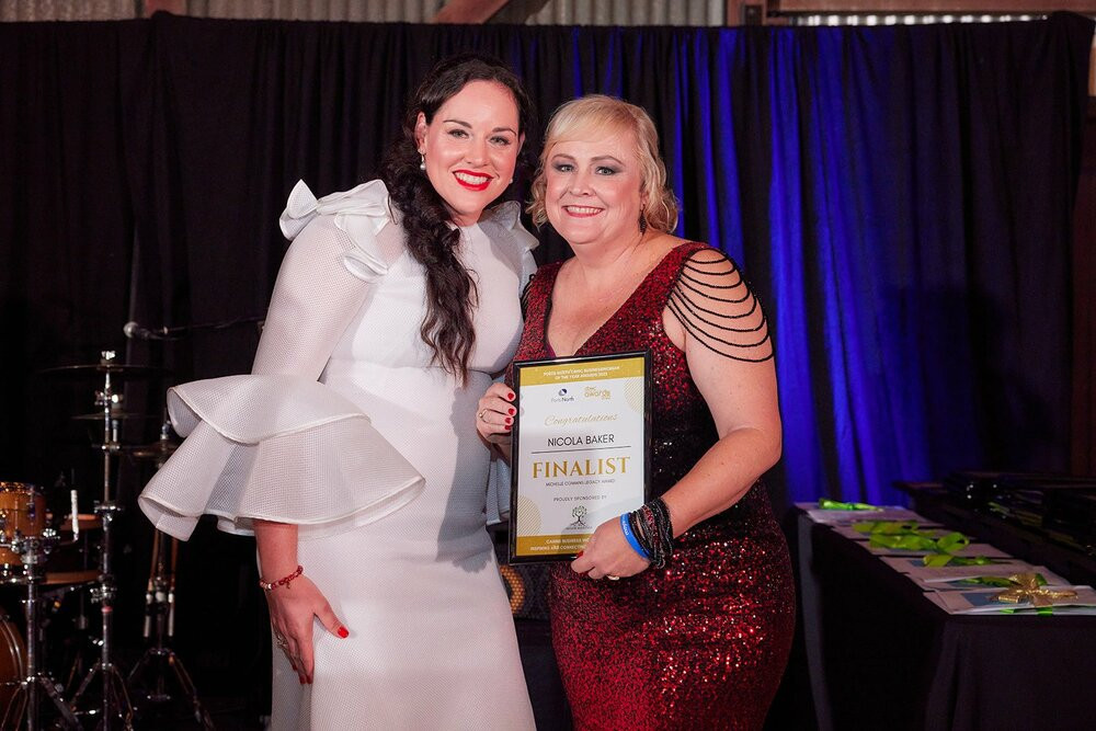 Ravenshoe mum and Moyamoya Foundation founder Nicola Baker (right) accepting the Michelle Commins Legacy award from Cairns Businesswomen president Krista Watkins. PHOTO BY ROMY PHOTOGRAPHY