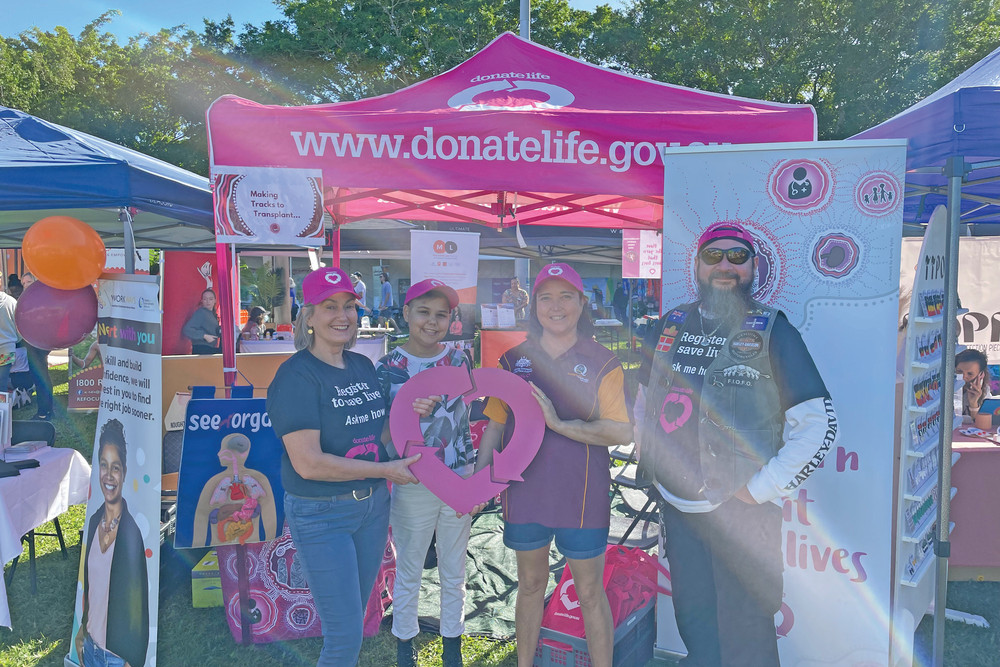 Cairns Hospital ICU specialist nurse Loren Ginders (left) with liver recipient Maddi Sivyer, kidney recipient Sabrina Davies and Atherton kidney recipient Anthony Rosendale at the NAIDOC Week market day at Fogarty Park on Friday.