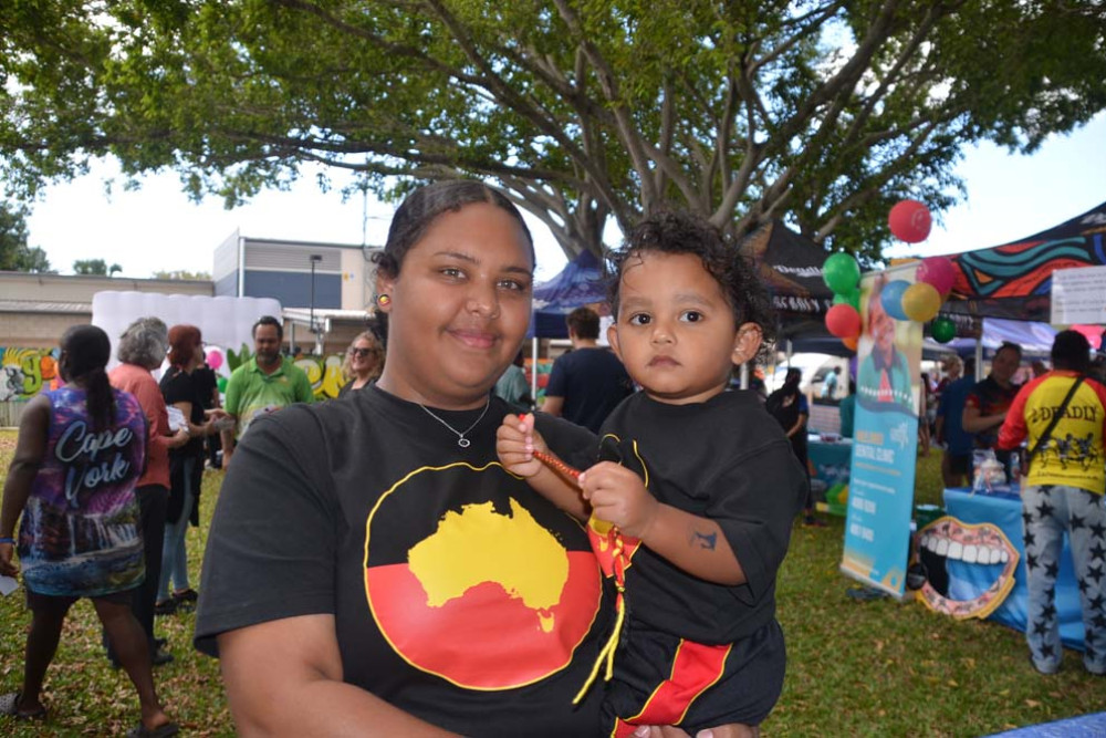 Kyisha Williams with two-year-old Dwayne Junior Williams at the Mulungu event.