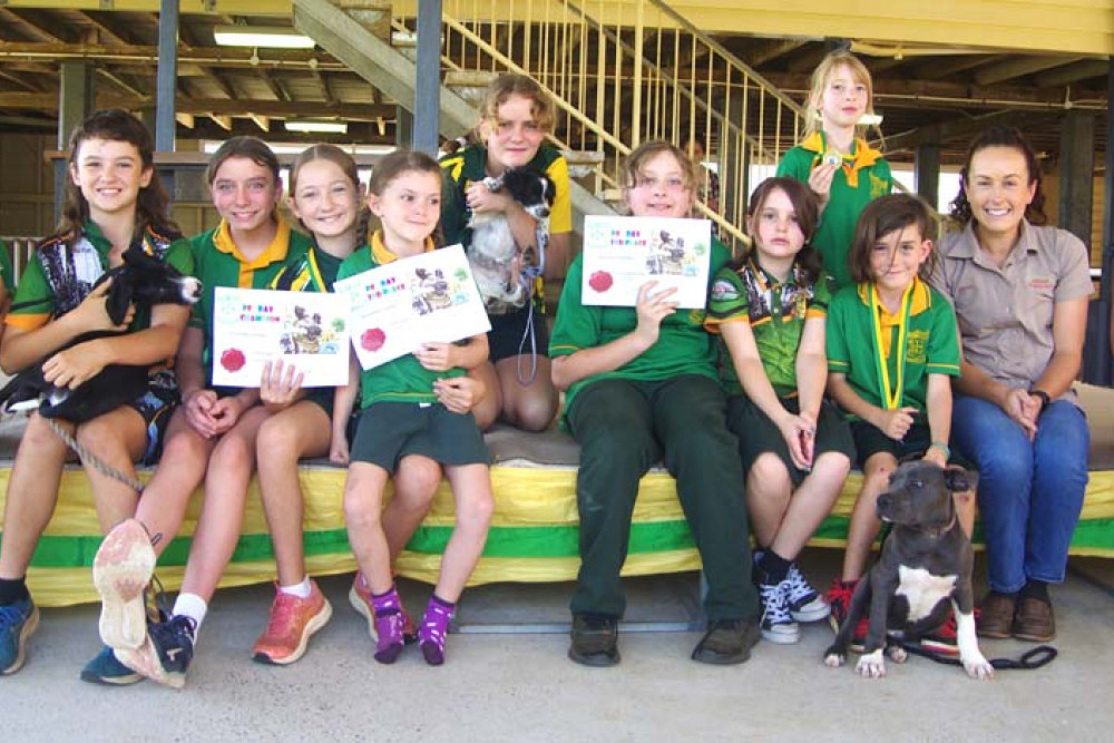 Millaa Millaa State School students with their pets, and judges Dr Laura Seccull from Tableland Veterinary Service and acting principal Michelle Messina at the school’s 2023 Pet Day.