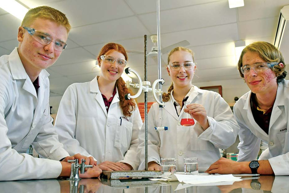 Chemistry students Dylan Scrivener, Bridie Keevers, Charlotte Nunn and Jean Pluschke participating in a titration experiment ahead of the Royal Australian Chemical Institute’s School Titration Competition.