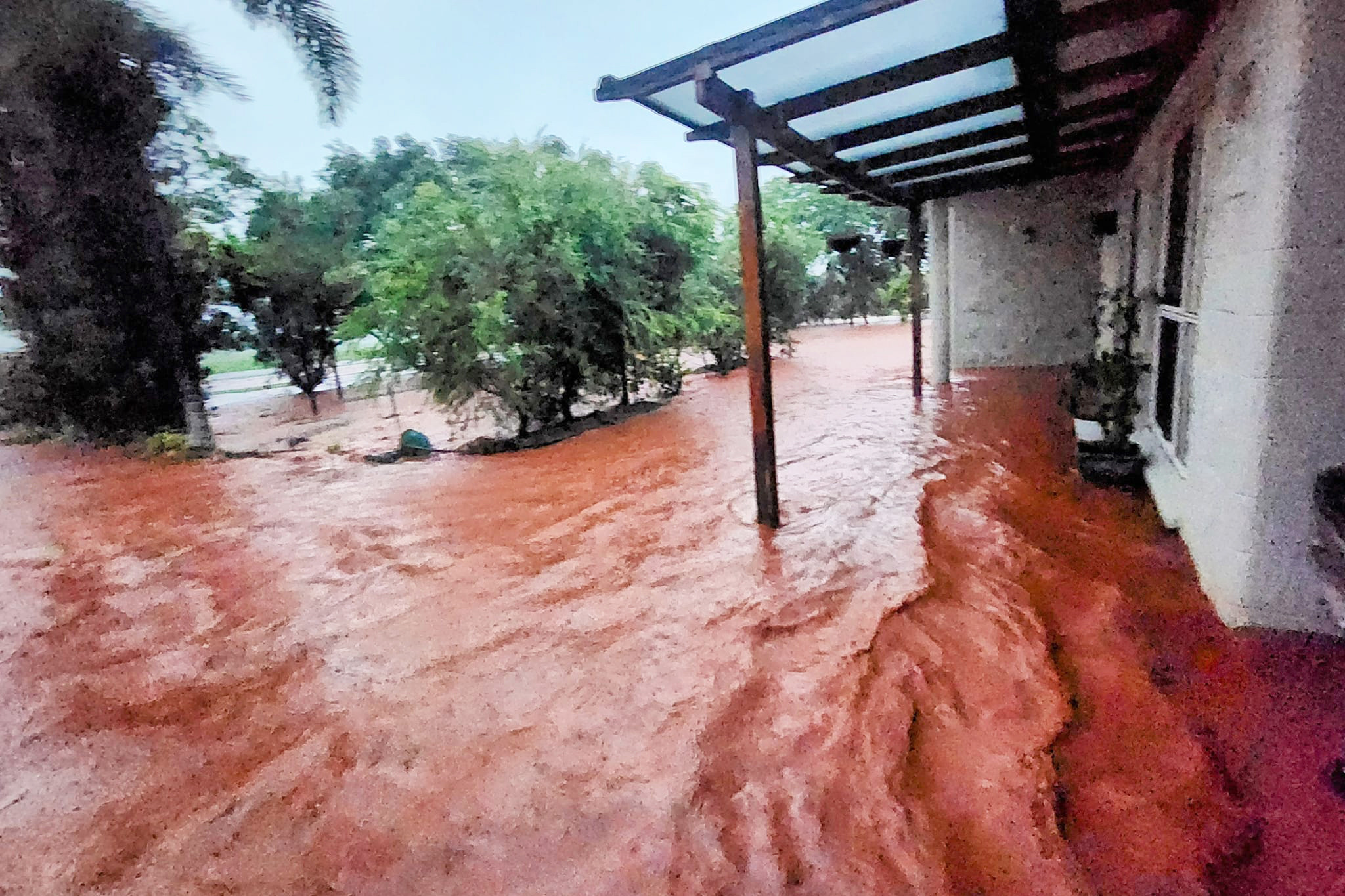 Flooding along Ray Road after a heavy storm.