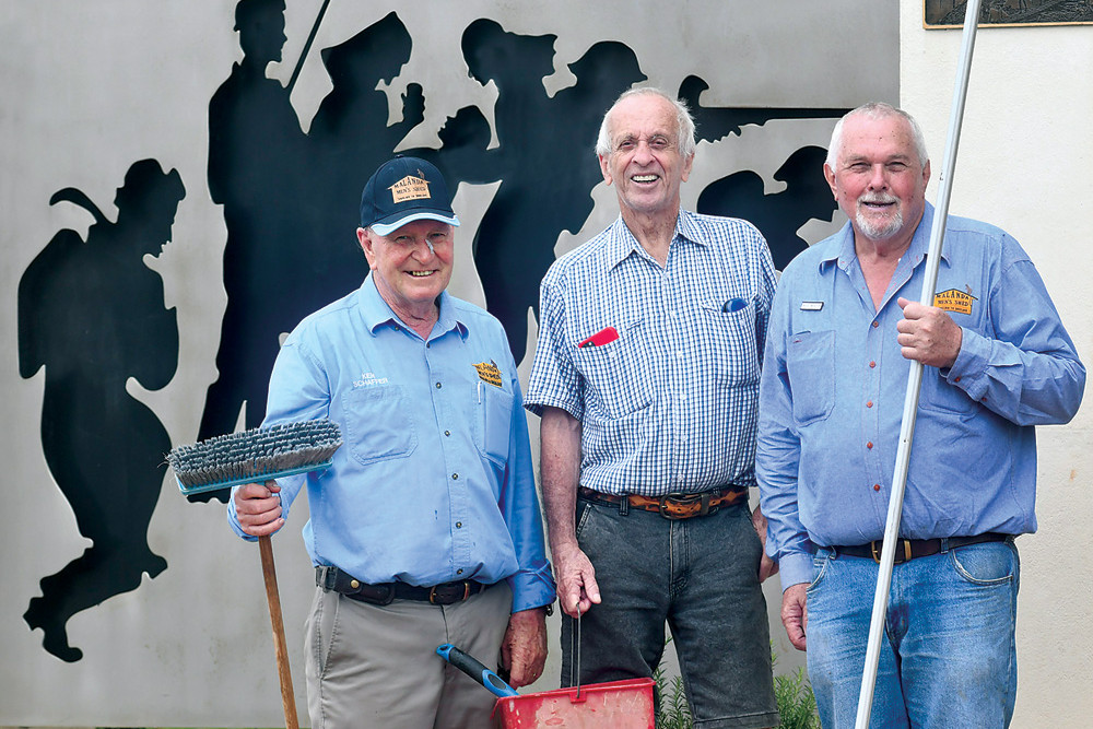 Ken Schaffer, Bob Egan and Neil Waite cleaning the Eacham Memorial Gates last week ahead of Remembrance Day this Friday.