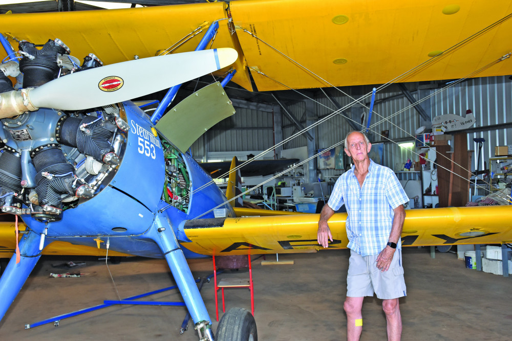 Long time pilot Richard Rudd says he intends to start legal proceedings against Mareeba Shire Council. He’s pictured here inside the controversial hangar. INSET: The bed Council suggested indicated permanent residency at the hangar.