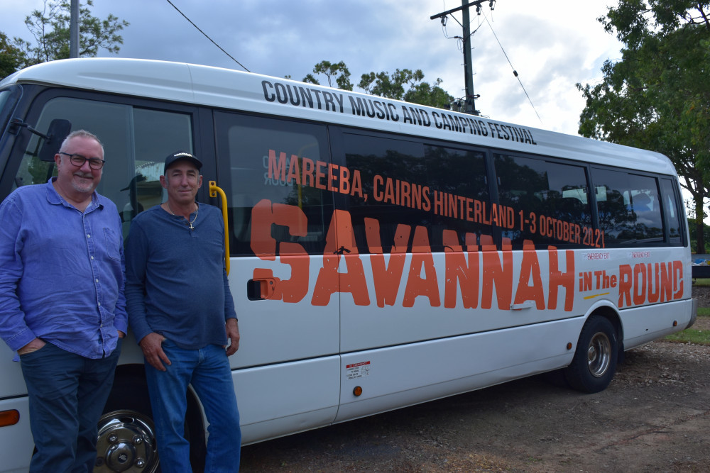 Savannah promoter James Dein with Nipper Brown in front of the bus. Dein will use the bus to promote the country music festival.