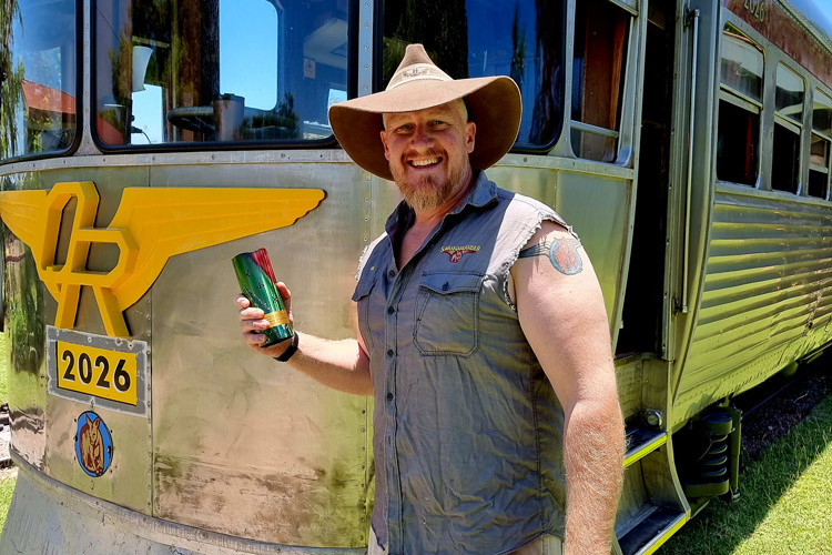 Wil Kemp, who loves his job so much he has the logo tattooed on him, has won the Tourism Tropical North Queensland’s Customer Service Excellence award for 2022